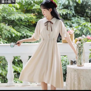 Váy trắng dáng suông cổ nơ