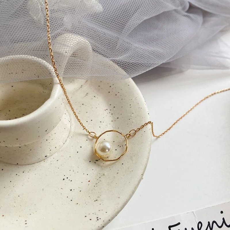 Dây chuyền kim loại mặt tròn đính ngọc trai nhân tạo đơn giản thời trang cho nữ