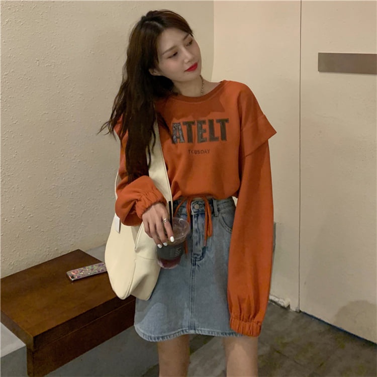 Áo croptop dài tay nỉ ATEL rút gấu tay phối bèo phom rộng dáng suông cực xinh | BigBuy360 - bigbuy360.vn