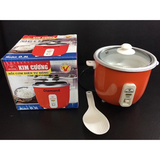 Nồi cơm điện Kim Cương 0.3 lít nắp kính