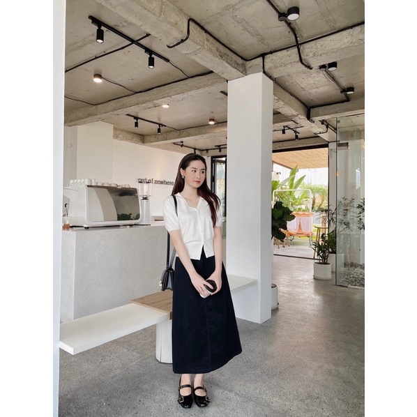 Áo len trắng cổ V