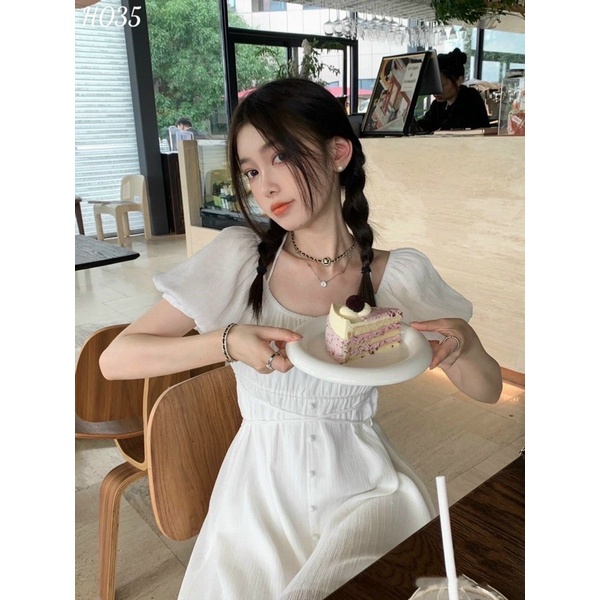 Váy trắng tay phồng đan dây eo nút bọc tiểu thư