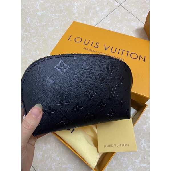 Túi cầm tay da thật