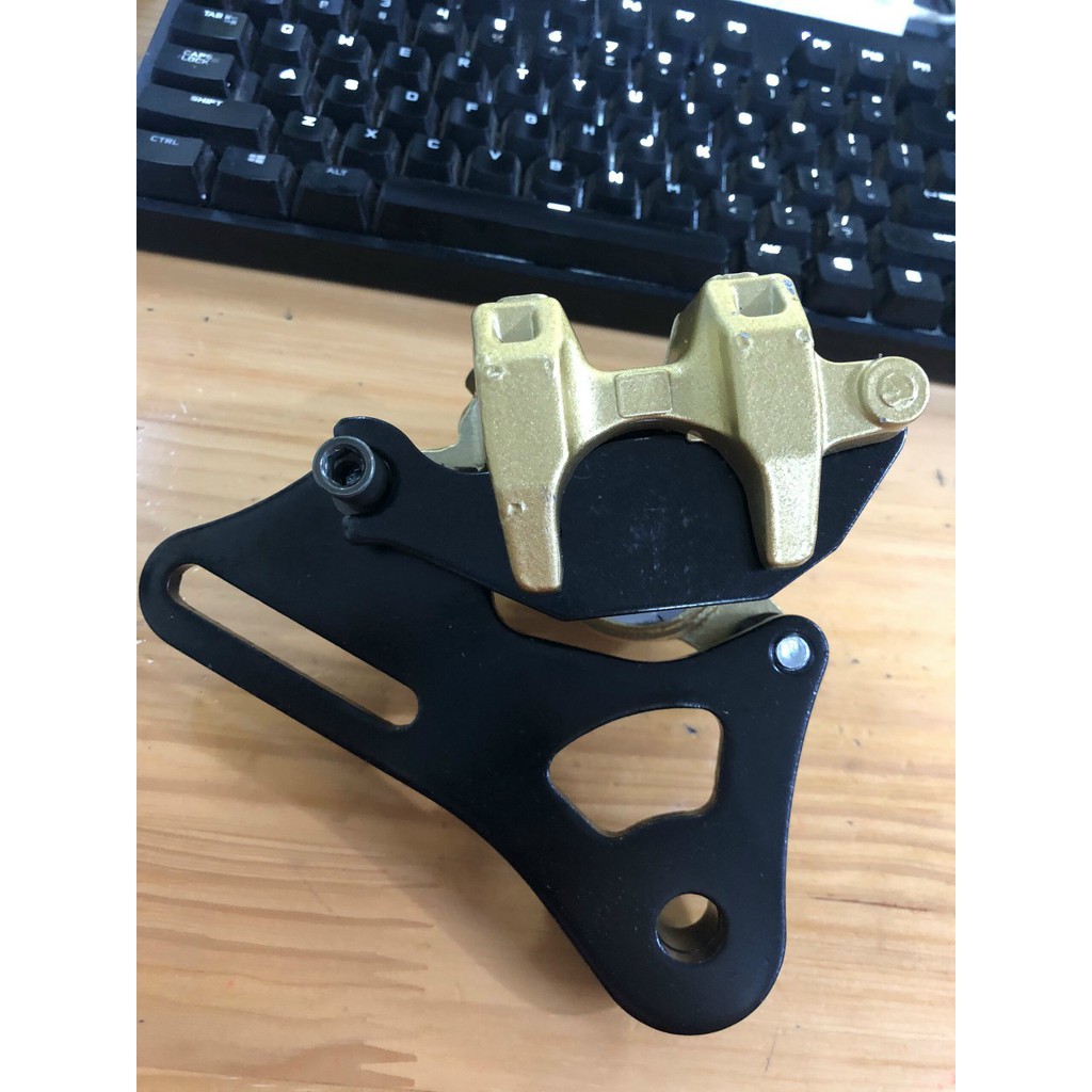 Heo dầu sau Exciter, Ex135 bằng hợp kim siêu bền hãng Nisin cho xe yamaha