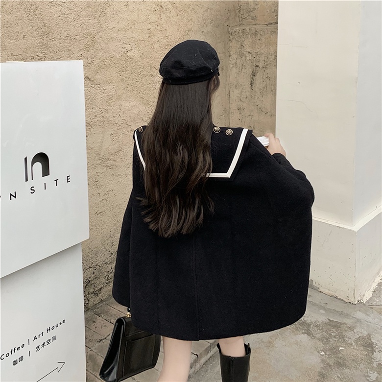 Áo khoác cape đen cổ viền trắng thời trang cá tính sang chảnh