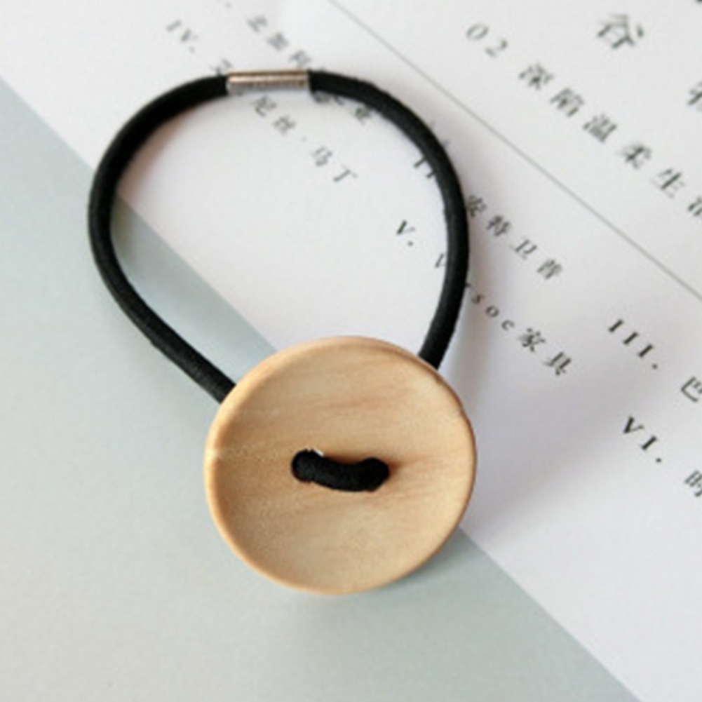 Dây cột tóc hình nút gỗ xinh xắn cho nữ