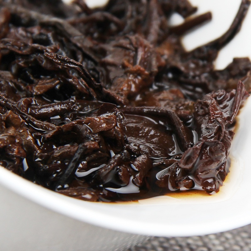 BÁNH TRÀ PHỔ NHĨ CHÍN VÂN NAM KIM NHA LÃO BAN CHƯƠNG 11 NĂM TUỔI 357 GRAM (NĂM SẢN XUẤT 2011)