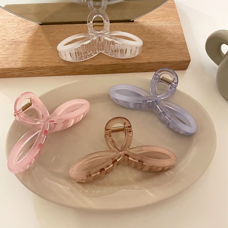 Cặp tóc nhựa trong 3 cánh hoa
