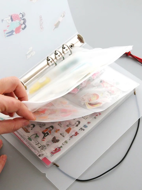 Sổ còng kèm túi zip và sheet đựng stickers (có lẻ sheet refill)