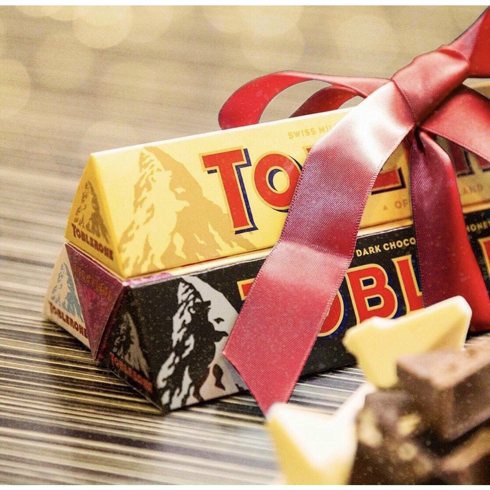 Kẹo Socola Toblerone Swiss Dark Chocolate With Honey & Almond Nougat 100g
