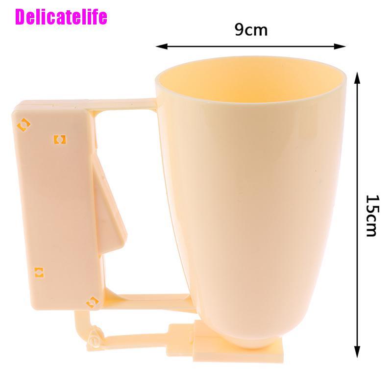 1 phễu rót bột làm bánh cầm tay có thể điều chỉnh