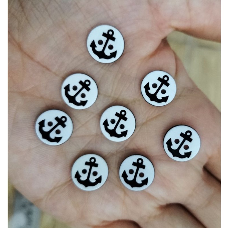 Set 50 nút nhựa trắng hoạt hình