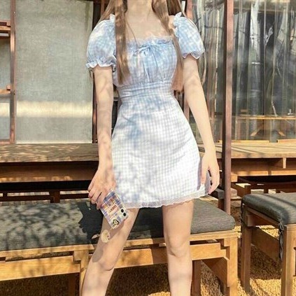 Đầm caro nơ ngực mặc được hai kiểu cực xinh xắn