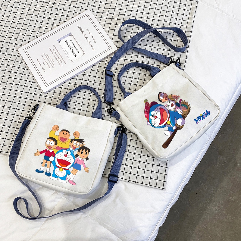 Túi Vải Canvas Đeo Chéo In Hình Doraemon Dễ Thương Dành Cho Học Sinh
