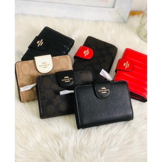 Ví Coach mini cầm tay nhỏ gọn