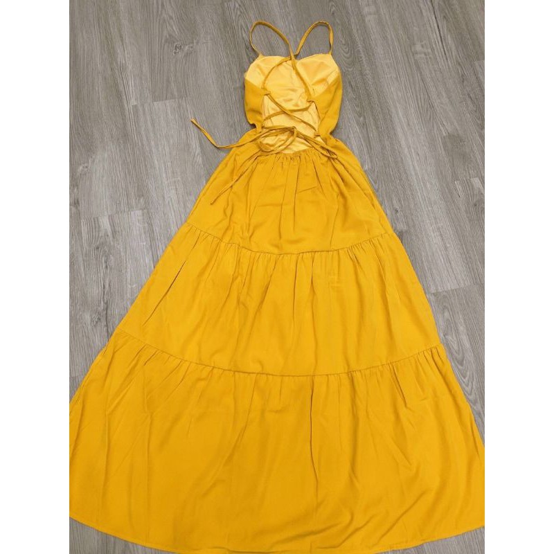 Đầm maxi vàng đan lưng sau