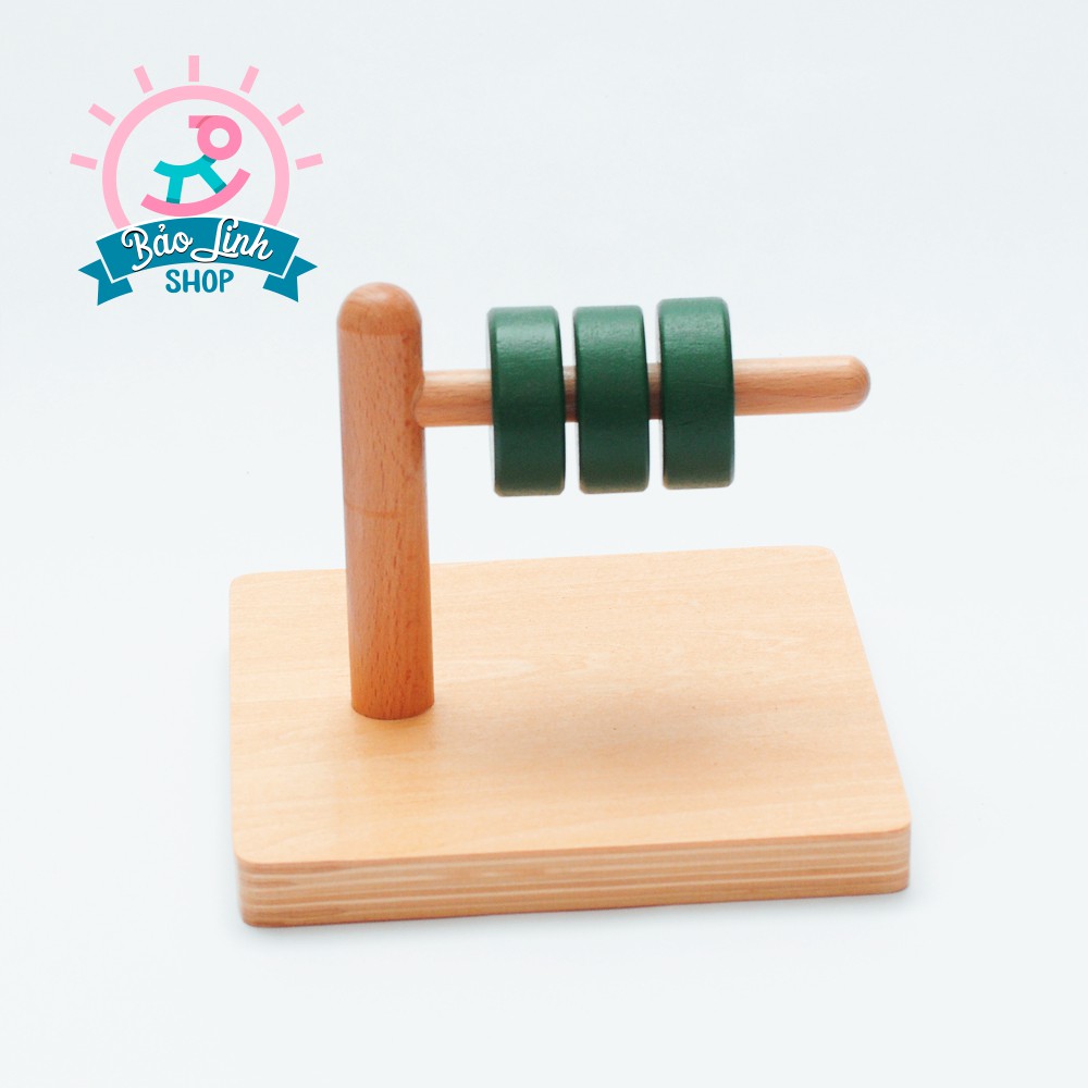 Giáo cụ Montessori 0-3 - Xâu khối tròn trên thanh trụ nằm ngang