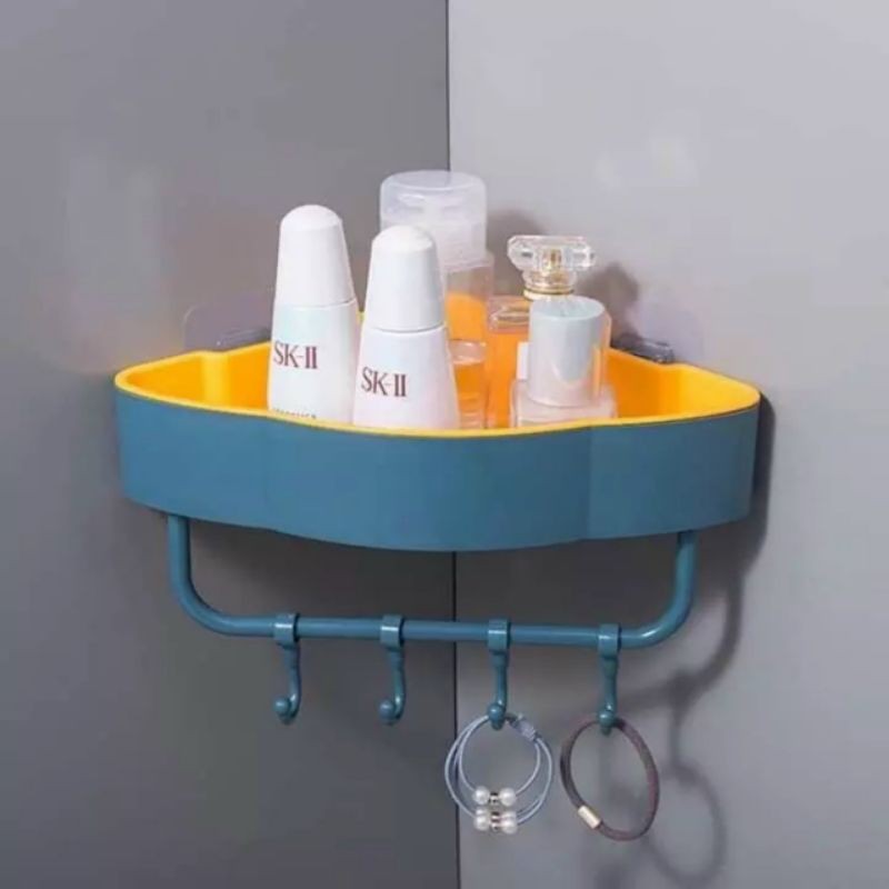 Kệ góc dán tường có móc treo.