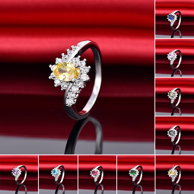 Nhẫn đính hôn đá Zircon xanh