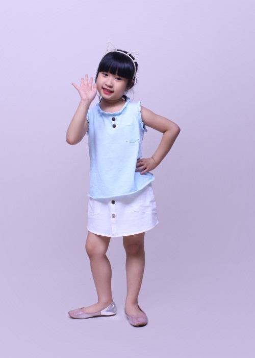 Chân váy bé gái thời trang Jadiny nút gỗ màu trắng