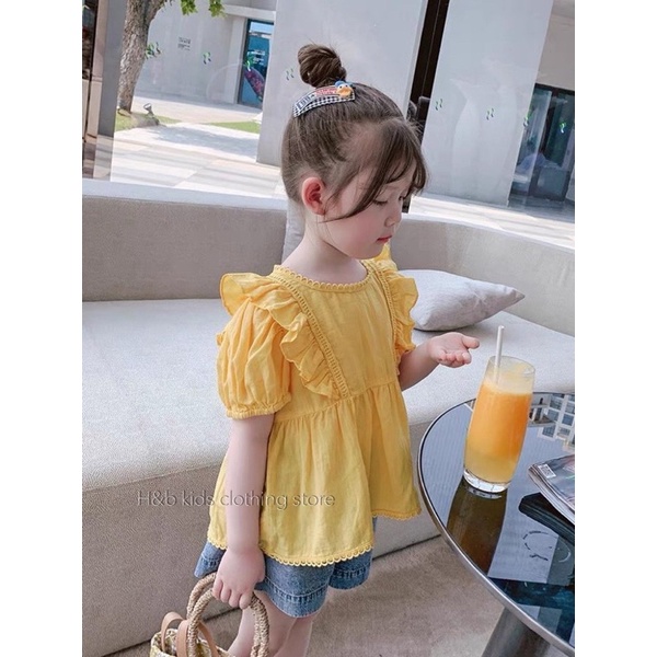 Set áo đũi vàng quần jean bé gái