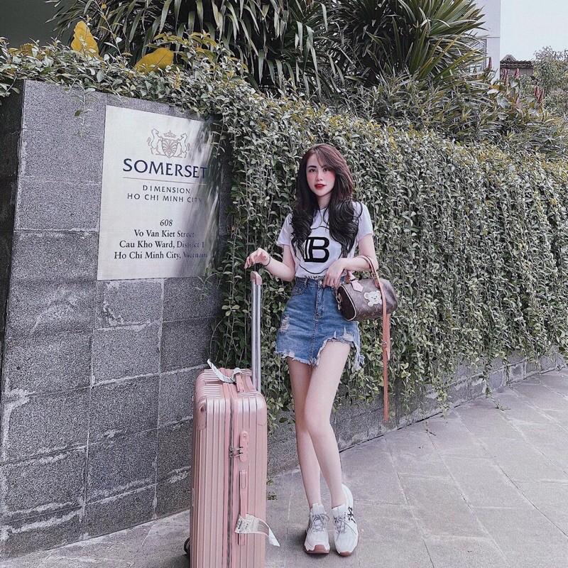 Chân váy jeans rách vạt lệch