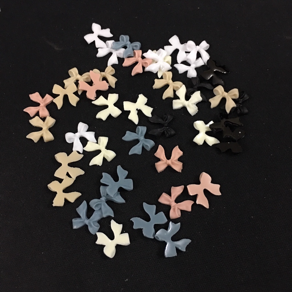 Set charm nơ xinh làm nail
