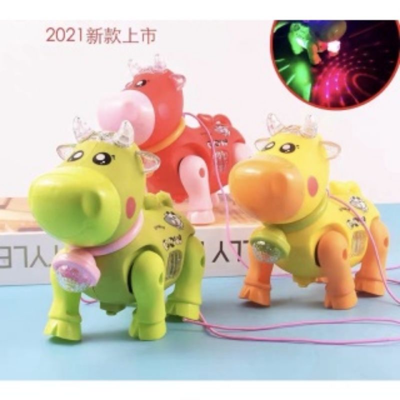 Đồ chơi con bò sữa đi dạo nháy đèn tặng kèm dây