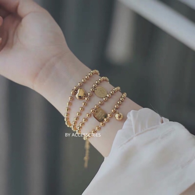 Lắc tay titan bi tròn phối mặt trái tim không gỉ WB190802