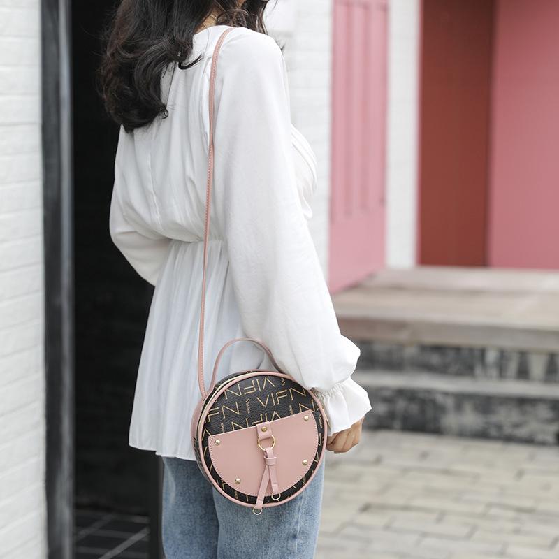 Túi đeo chéo hình tròn kích thước nhỏ thời trang thanh lịch cho nữ