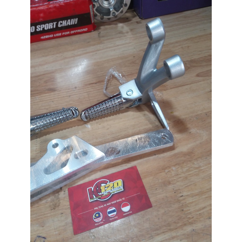 GÁC CHÂN KIỂU RAIDER-CHO XE EX135-EX150-BẠC-ĐEN-GĂN NHƯ ZIN