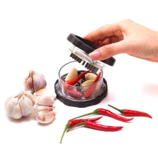 Dụng cụ xay tỏi cầm tay