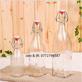 Chai Tròn nắp gài gong sat 1 lít