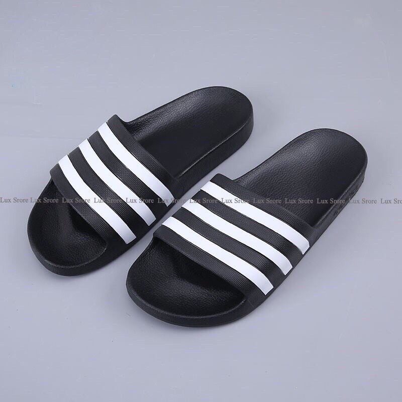 Dép quai ngang dép nam kiểu kẻ ngang đế nhẹ chống trơn trượt cao 3cm.Đức Nội Shop