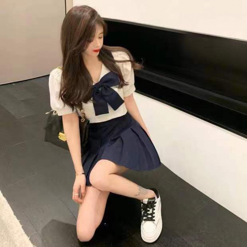 Set váy áo croptop chân váy Bộ Áo Ngắn Tay + Chân Váy Xếp Ly Lưng Cao Thời Trang Mùa Hè 2022 Mới A Eo Cao Thắt Nơ Phong Cách Pháp Ngọt Ngào Hàng Mới Cho Nữ
