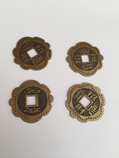 Tiền xu cổ 8 cánh