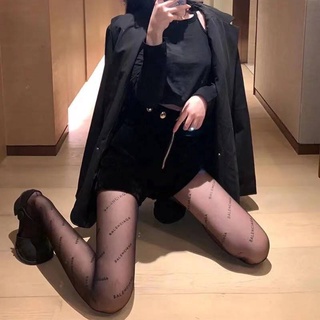 Quần tất Balenciaga