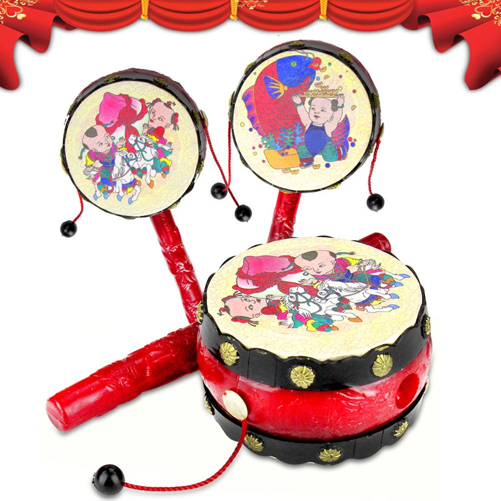 Baby Kids Cartoon Plastic Chinese Traditional Rattle Drum Spin fun toys Hand Bell Music Toys