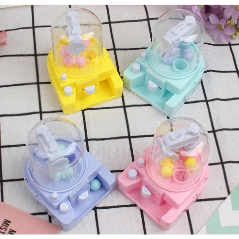 Đồ Chơi Máy Gắp Búp Bê Mini Cầm Tay Mắt Vui Nhộn Cho Bé