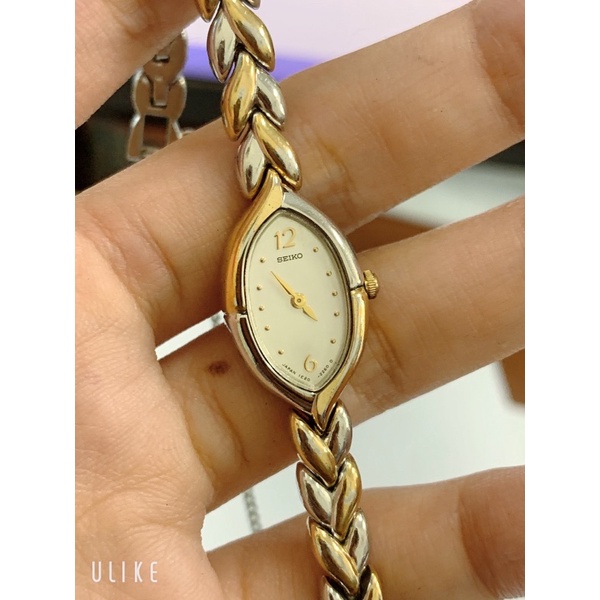 Đồng hồ si nữ hiệu SEIKO, dáng lắc, dây demi, mặt khảm trai
