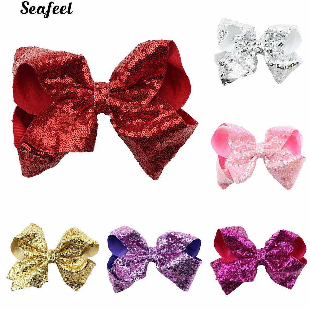 Kẹp tóc hình nơ đính sequin lấp lánh dễ thương dành cho nữ