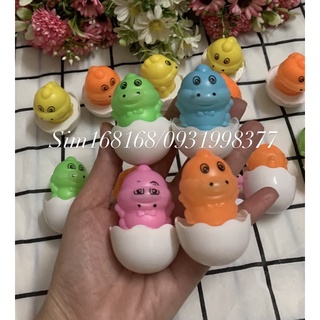 Kẹo c trái cây kèm đồ chơi con lập đập hình trứng khủng Long