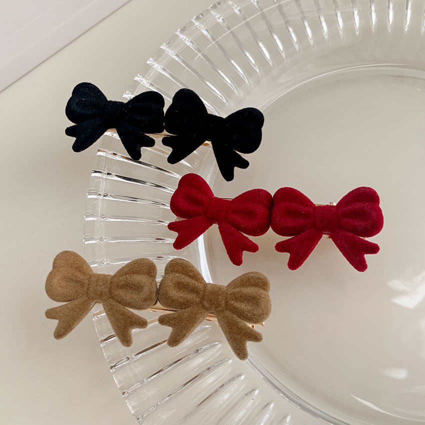 Kẹp tóc hình nơ xinh xắn cho nữ