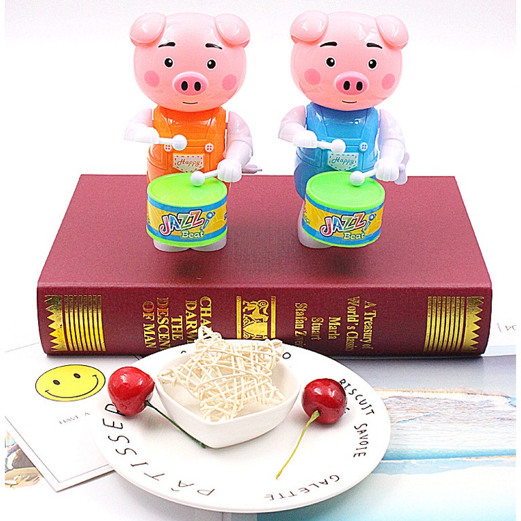Đồ chơi trống hình mèo và heo cho bé