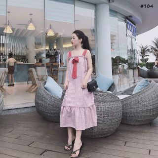 Đầm caro hồng nơ ngực