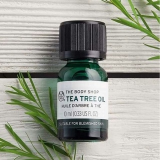 Tinh dầu giảm mụn the body shop tea tree oil