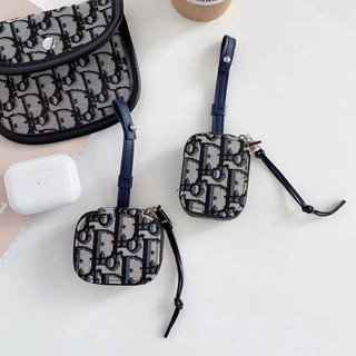 Vỏ Bảo Vệ Hộp Sạc Tai Nghe Airpods 1/2 Bằng Da Thật In Logo Dior Có Khóa Kéo Thời Trang