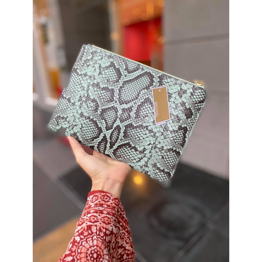 Túi xách cầm tay nữ Clutch Michael Kors