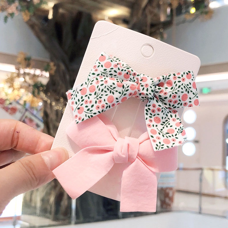 Set 2 Kẹp Tóc Nơ Hoa Màu Trơn Nhỏ Xinh Điệu Đà Cho Nữ