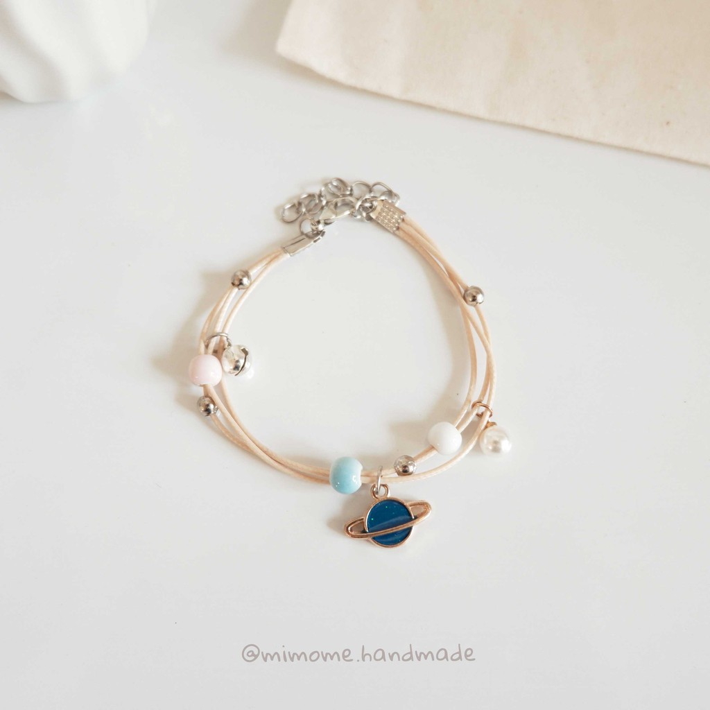 Vòng gốm phối charm màu móc kim loại